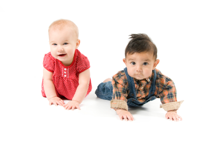 Twin baby boy and girl crawling